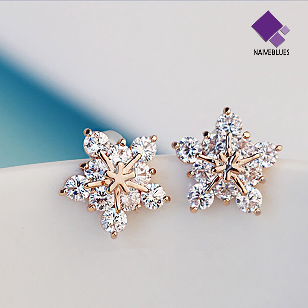 1 Pasang Anting Bentuk Kepingan Salju Aksen Berlian Imitasi Untuk Wanita