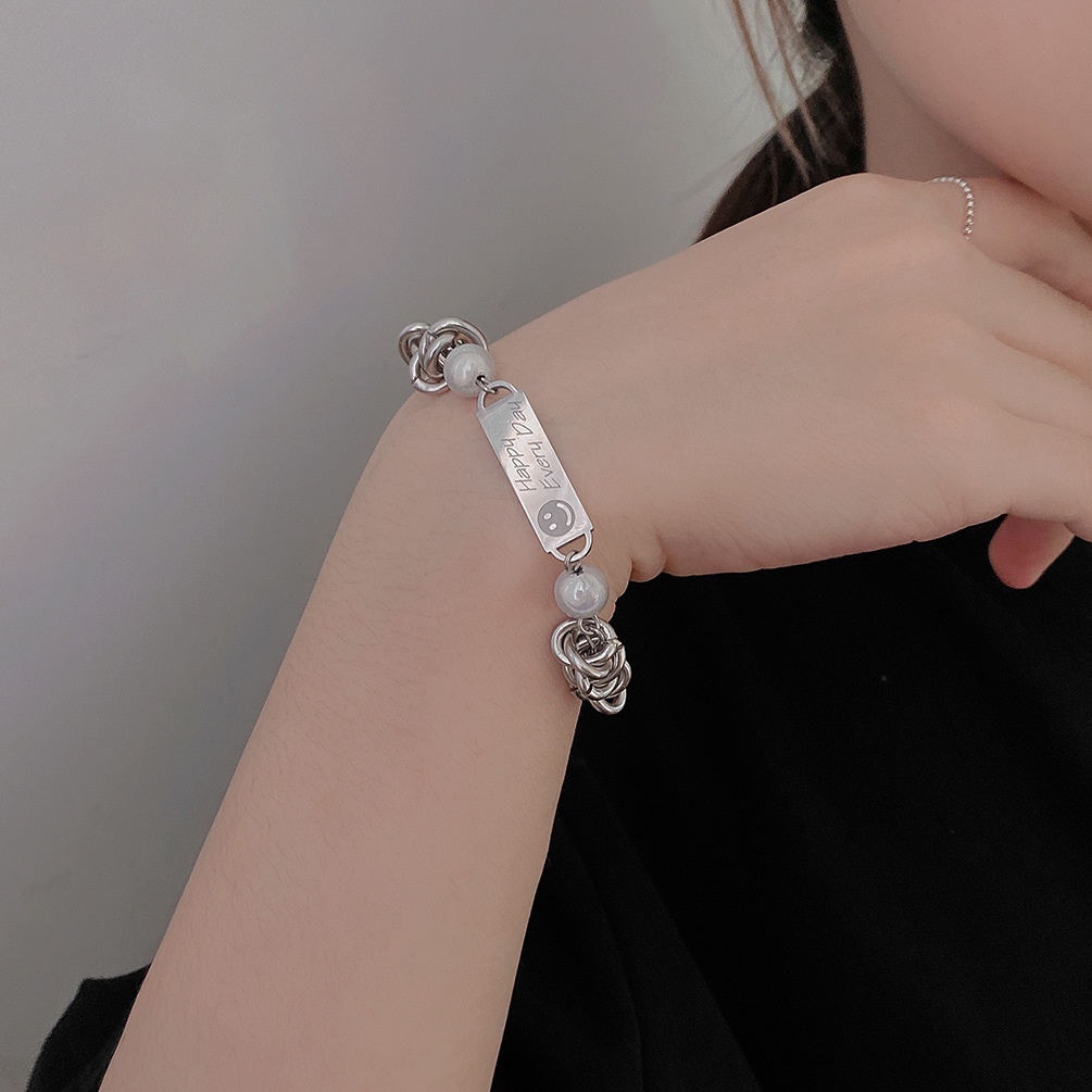 Special interest merek fashion titanium steel hip hop Gelang pria dan wanita reflektif Mutiara jahit