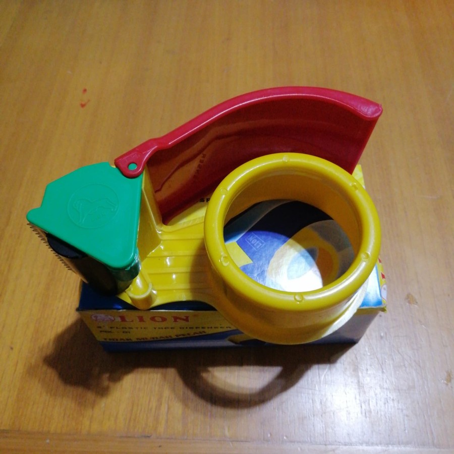 pemotong lakban/tape dispenser plakban/ opp tape dispenser Lion