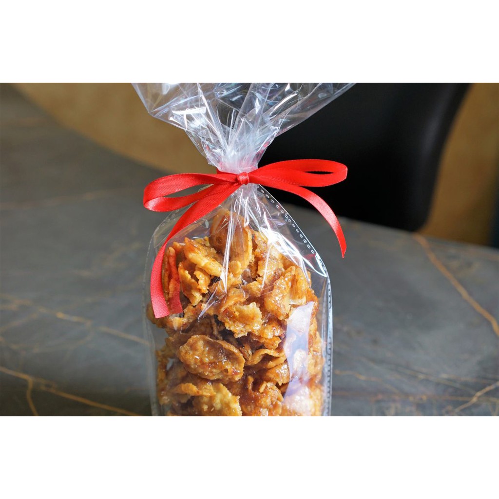 PROMO !!! PLASTIK DUDUK OPP POLOS UKURAN 16 x 33  / PLASTIK JAJAN LEBARAN ( ISI 100 PCS )