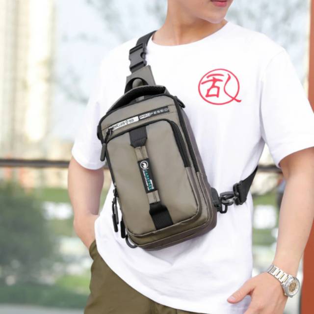 PROMO!!! Waistbag Pria - TRM WATERPROOF LIPAT 1AX802 Oranye. Bisa di Lipat. Parasud Y18 pria Army