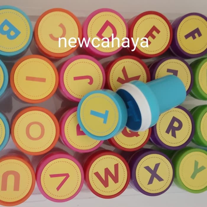 stempel motif huruf angka dan emoji