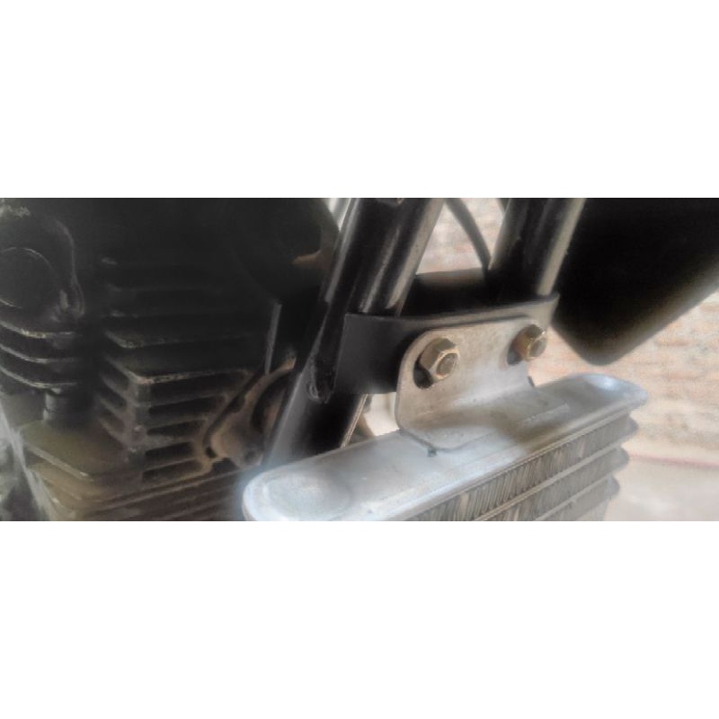 BREKET OIL COOLER SCORPIO