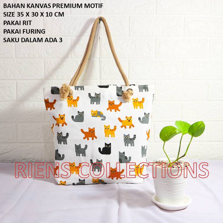 RIENS COLLECTIONS. TOTEBAG KANVAS TALI SUMBU MOTIF KUCING LATAR PUTIH. TAS KANVAS. TAS JOGJA. SOUVENIR JOGJA