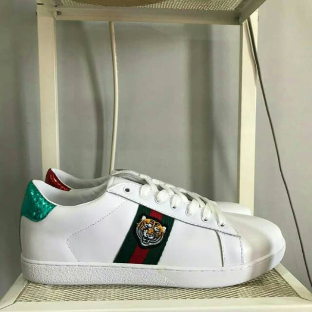 gucci tiger trainers