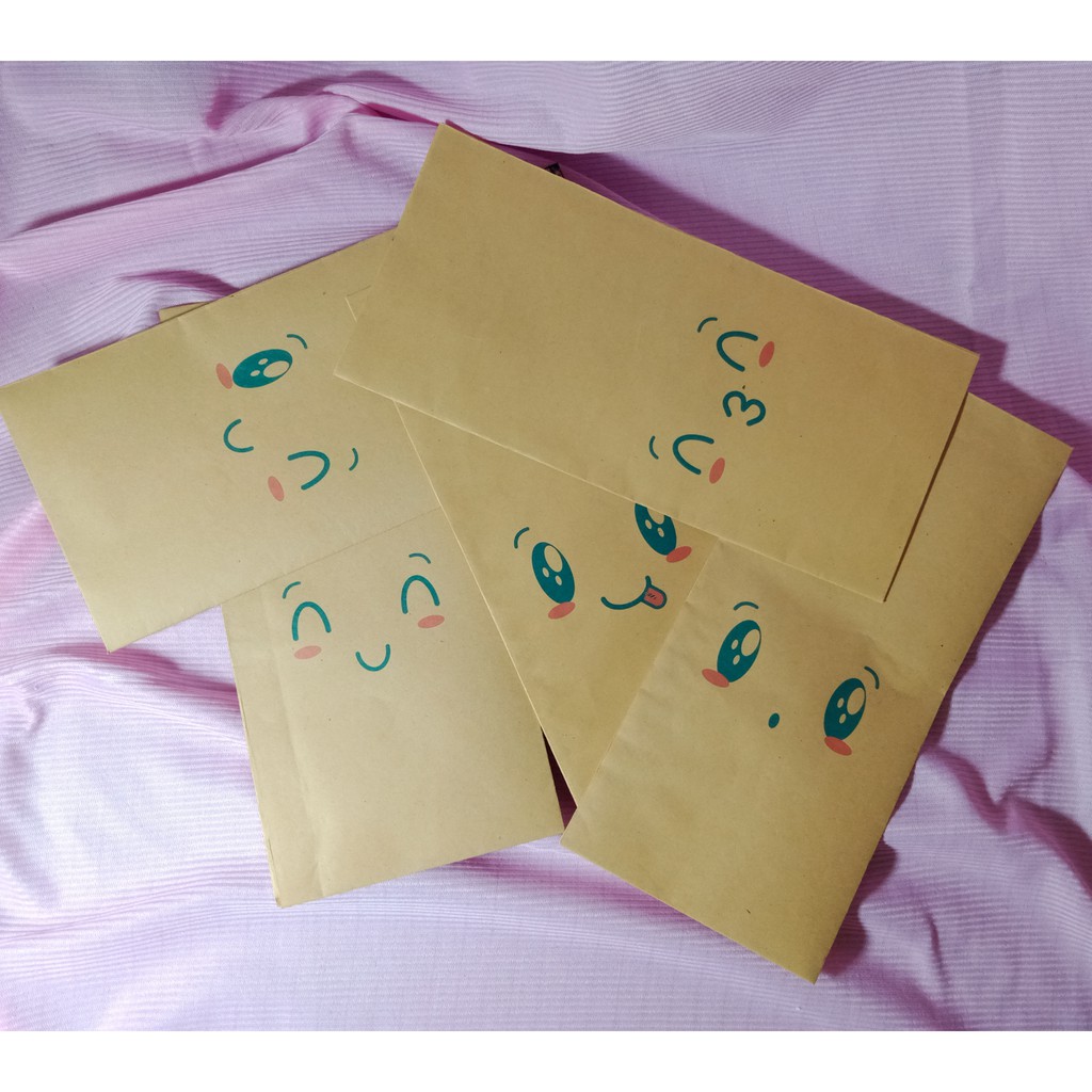 

AMPLOP COKLAT PACKAGING MOTIF EMOTICON