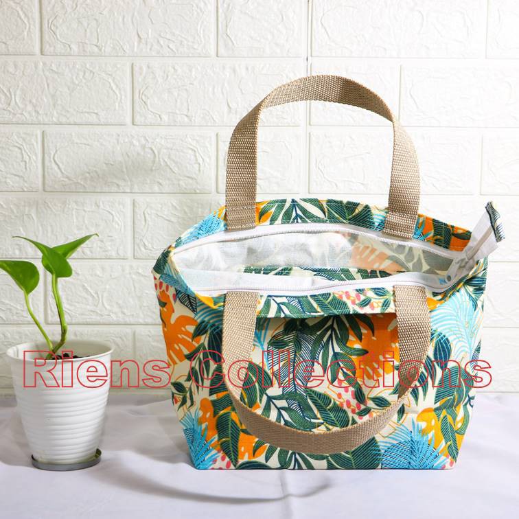 RIENS COLLECTIONS. HANDBAG BESAR BAHAN KANVAS MOTIF FLORAL KUNING