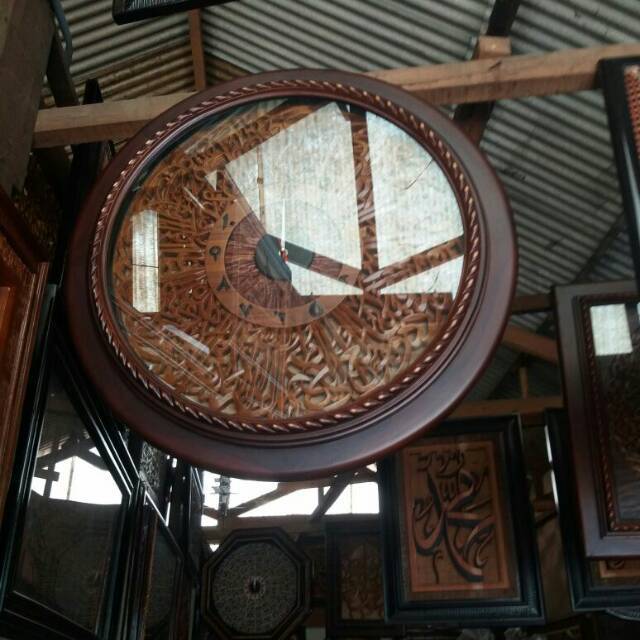 jam kaligrafi bundar mebel jepara,furniture