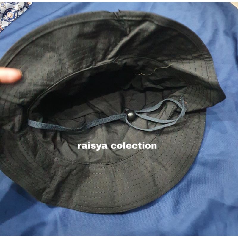 topi rimba hitam