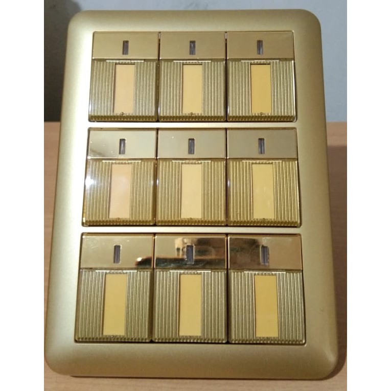 Saklar 9 Gang Warna Gold "Cosmo Art" Panasonic