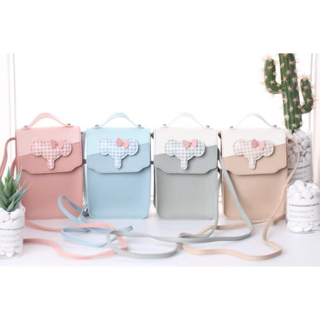 Tas dompet hape selempang impor wanita termurah bermotif