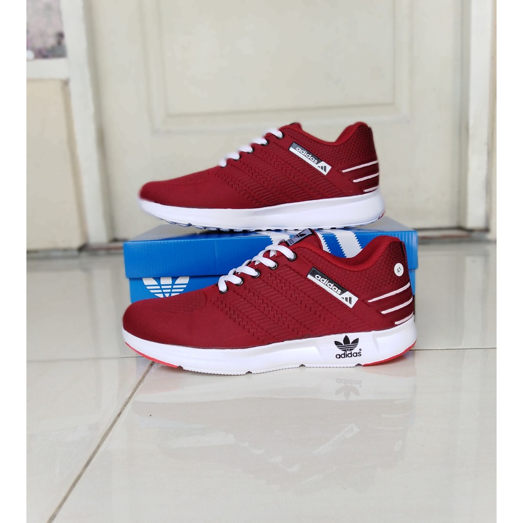 burgundy adidas running shoes
