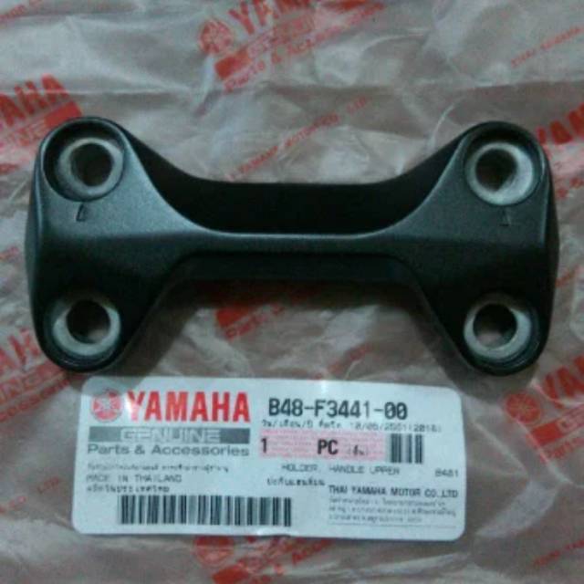 raiser atau jepitan stang xabre ori YGP