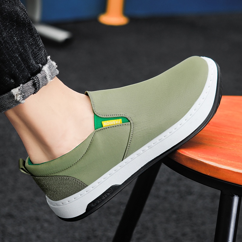 HIGHLAND Sepatu Pria Slip On Casual Sepatu Cowok Slop Kerja Kuliah Trendy Fashion MC118