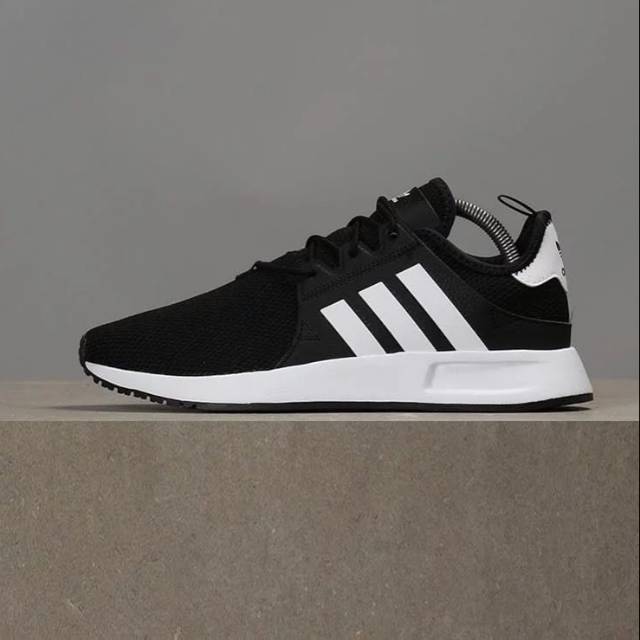 black and white adidas xplr
