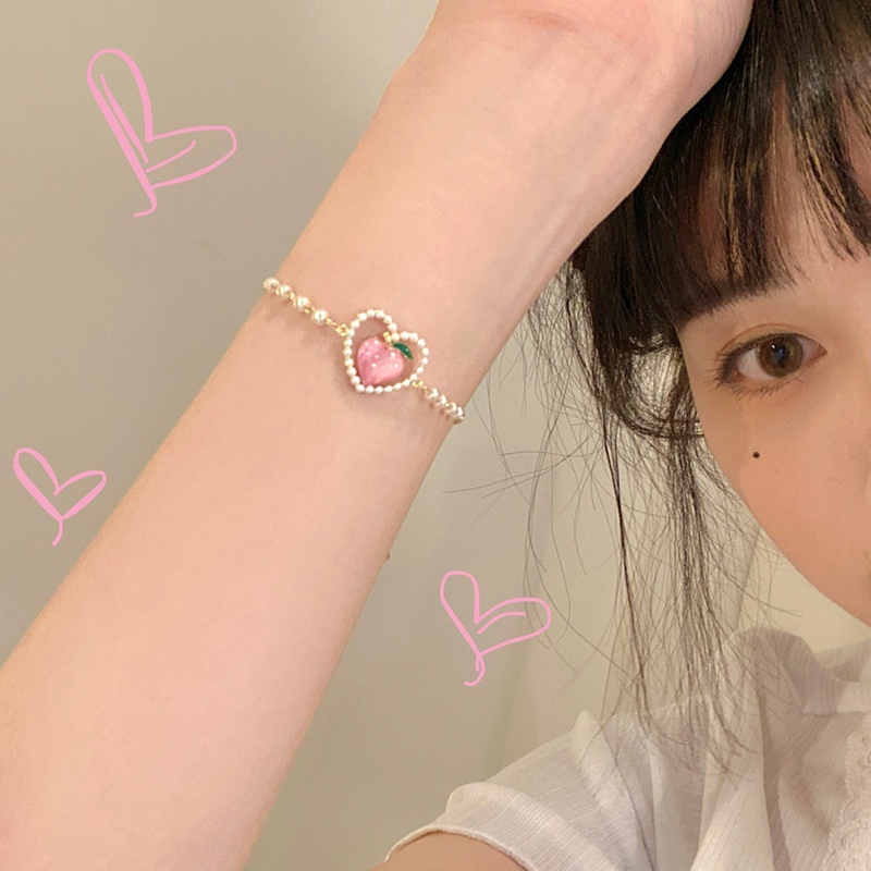 AY(CN) Gelang Rantai Mutiara Bentuk Hati Model Hollow Warna Pink Peach Untuk Wanita