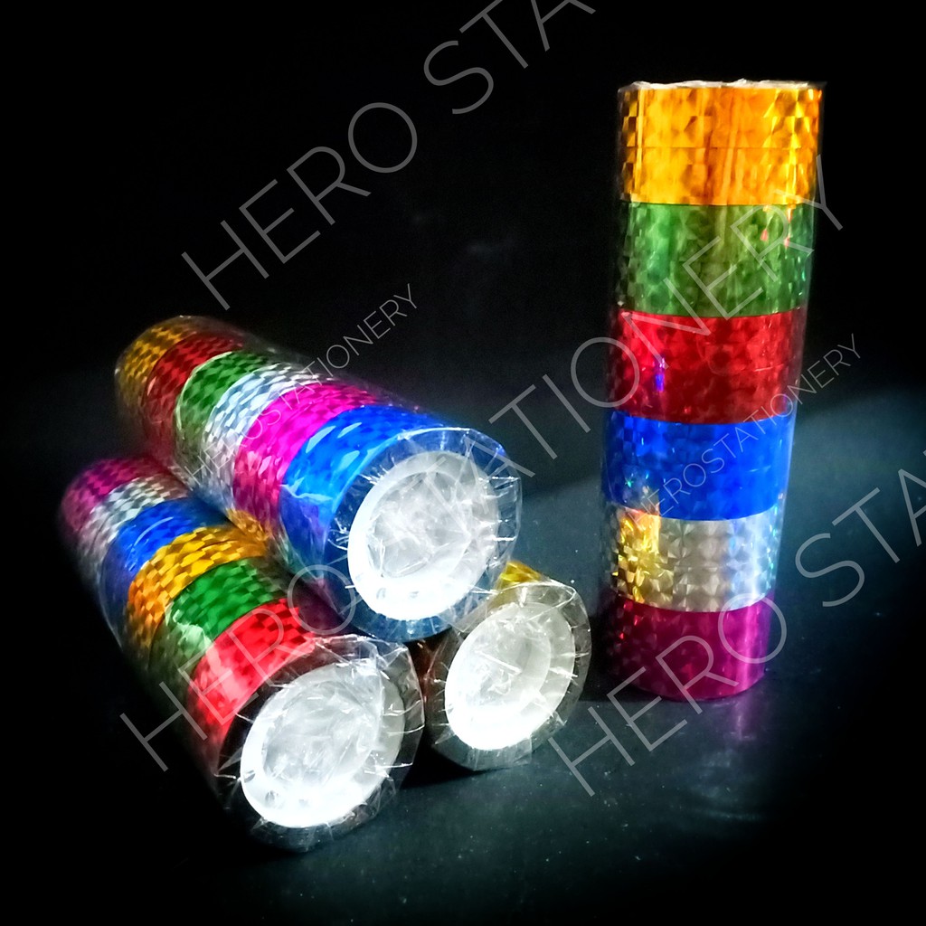 

Selotip solatip isolasi plester hologram warna 0.5 inch tebal gulungan 0.5 cm . 12 roll