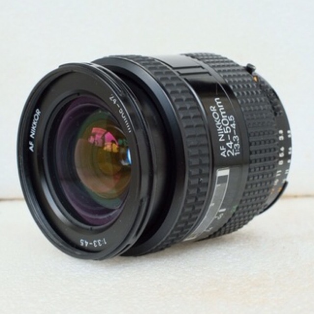 Lensa Nikon AF Nikkor 24-50mm f3.3-4.5 vintage klasik terawat.