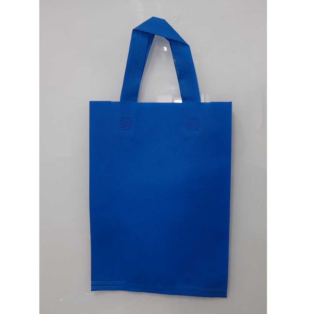 

Tas Press Spunbound Tali Goodie Bag Tas Belanja Warna Biru Turkis 30 cm x 40 cm