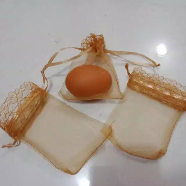 Sarung tile souvenir (sarung telur)