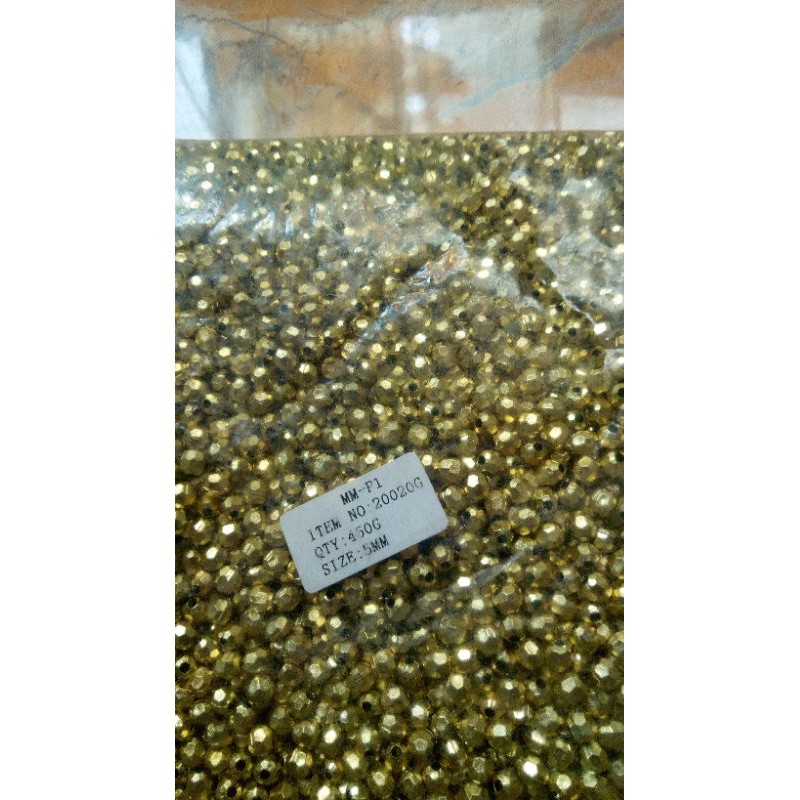 mote imitasi gold 5mm