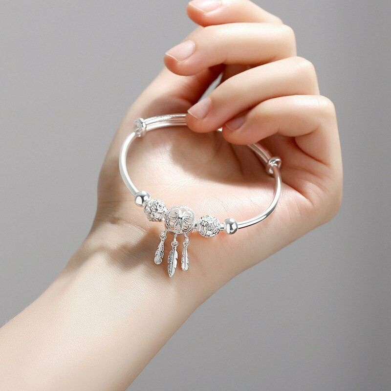 Gelang Bangle Adjustable Desain Bulu Burung Merak Warna Silver Untuk Wanita