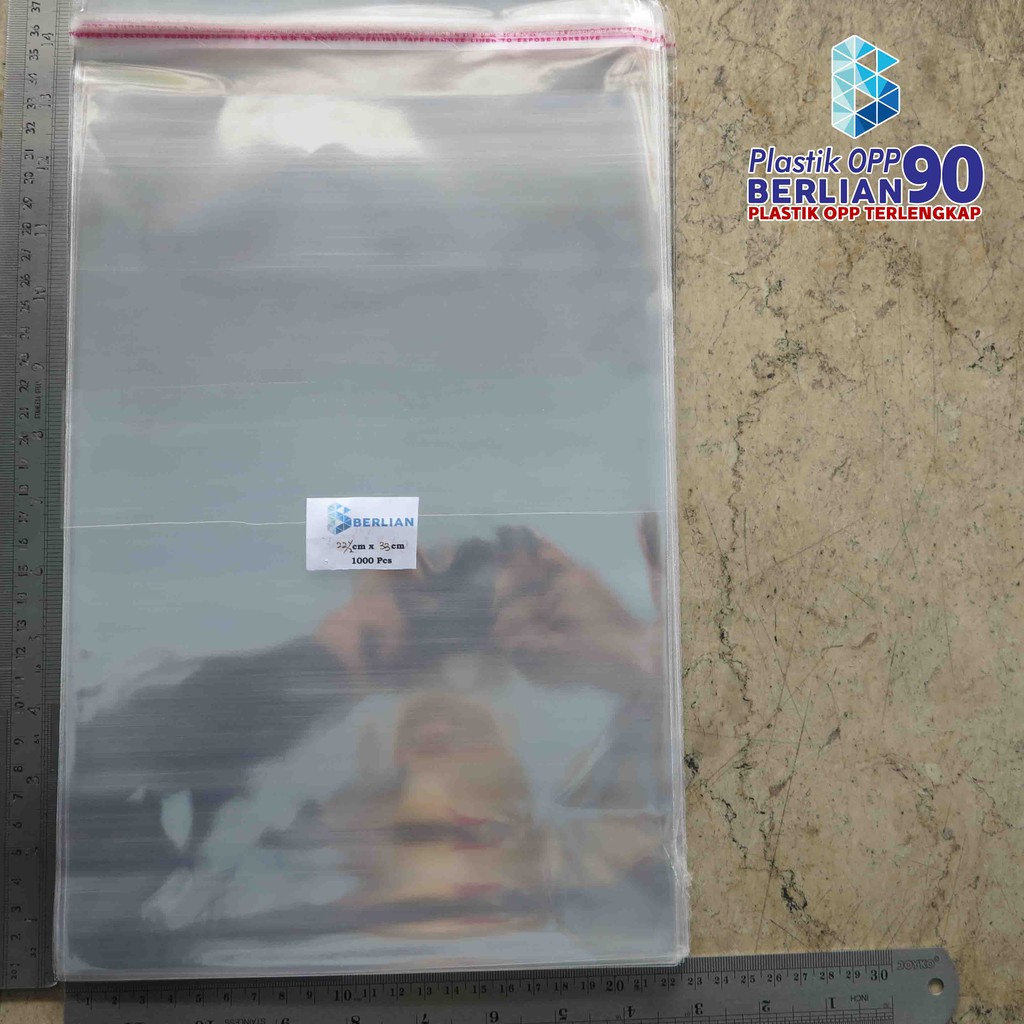 

22,5X33 CM PLASTIK OPP (SEAL/LEM) TEBAL 20 MIC ASLI / PLASTIK KEMASAN
