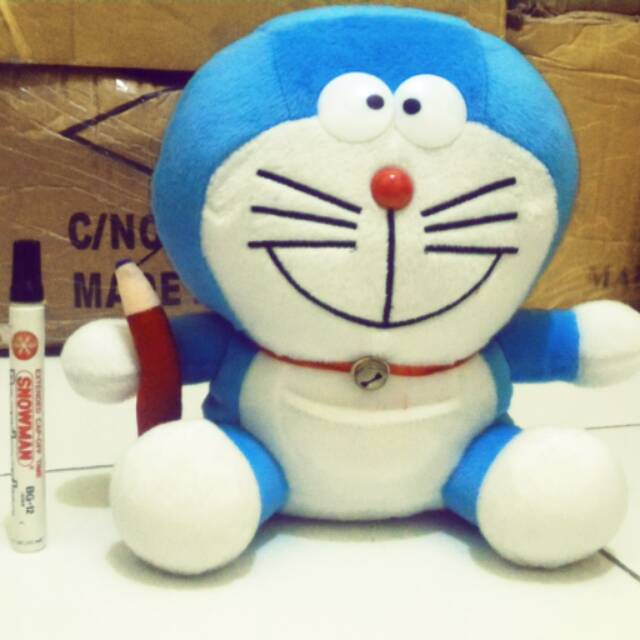 

Boneka doraemon Pensil/ wisuda