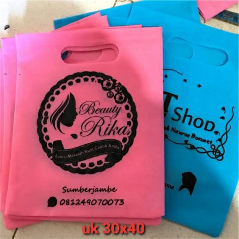 

tas spunbon oval30x40 sablon custom - tas kain spunbon - tas souvenir -tas hajatan - tas nikahan
