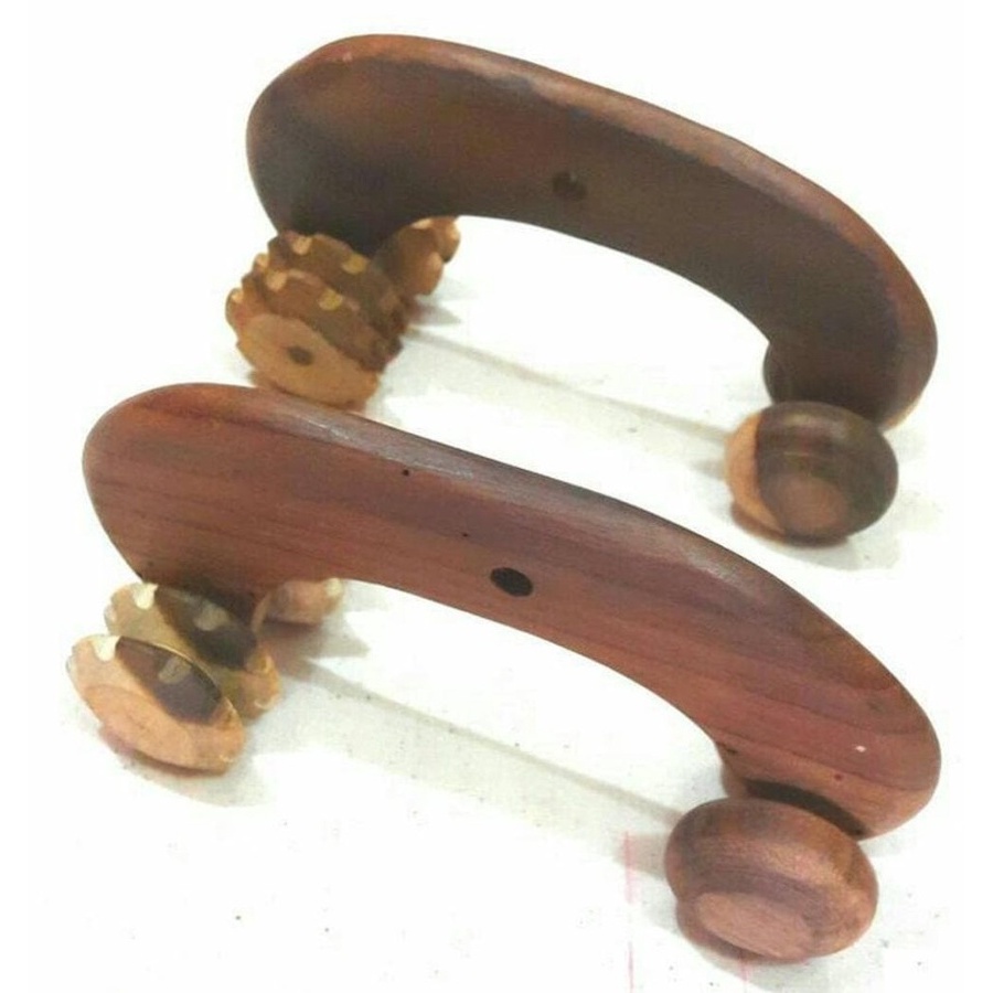 Alat Pijat Kayu Sonokeling Roda Empat  Alat pijat roda tradisional untuk melancarkan peredaran darah