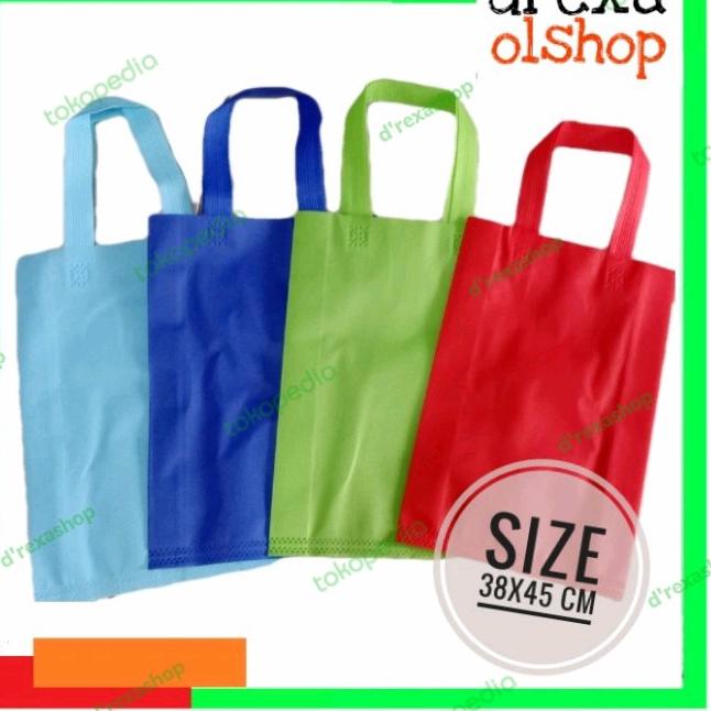 

Tas bingkisan tas souvenir tas spundbond polos warna ukuran 38x45 cm - Biru Muda