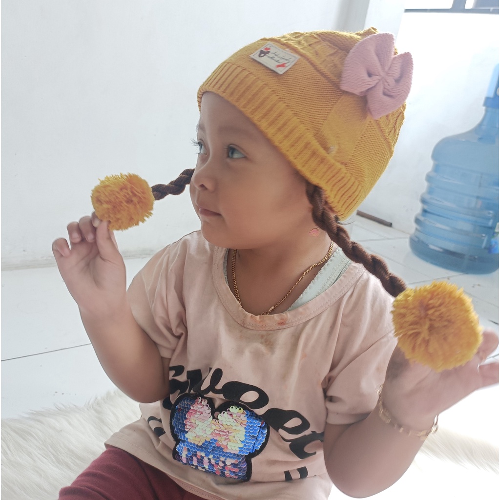 Topi bayi rajut kepang pita