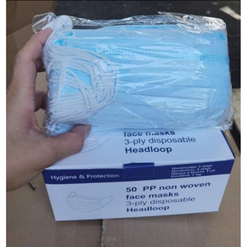 Masker kuping biru 1 box isi 50 pcs