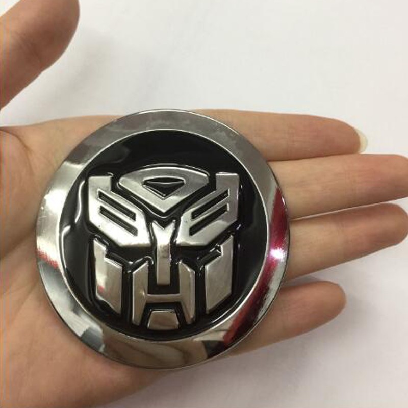 1Pc Stiker Emblem / Badge Metal 3D 65mm Transformer Autobot Warna Hitam Untuk Mobil / Truk