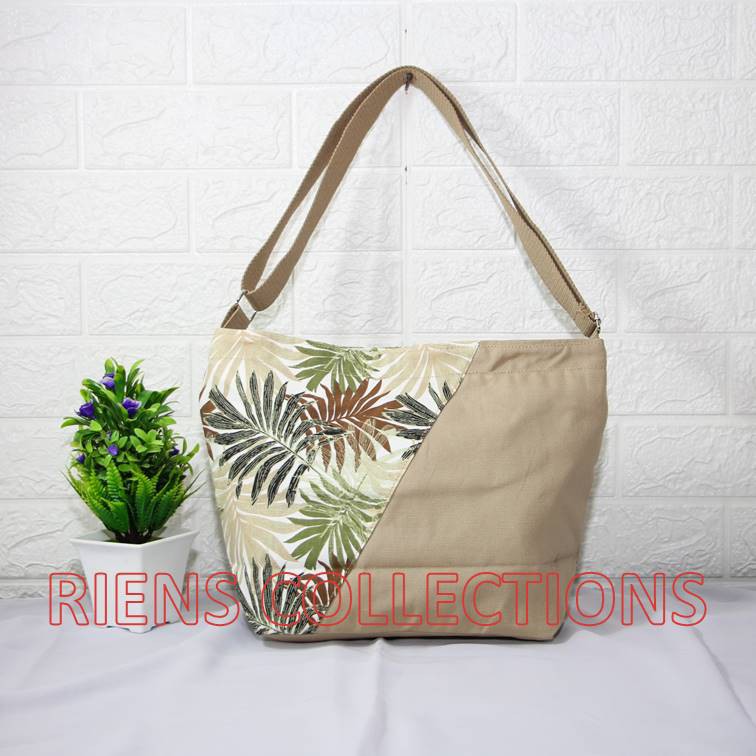 RIENS COLLECTIONS. TAS SELEMPANG SLING BAG KANVAS KOMBINASI FLORAL PALM COKLAT SLC0103