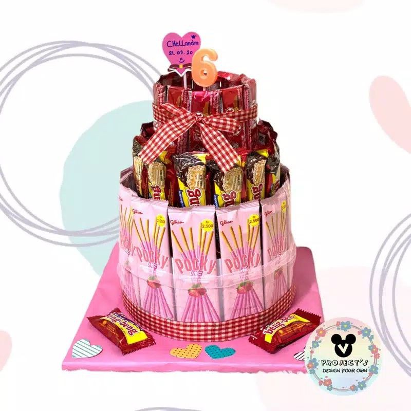 

parcel snack ulanh tahun bentuk kue