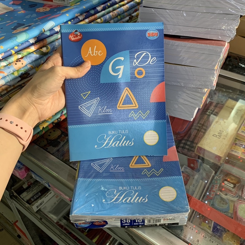 

Buku Garis Tiga / Buku Tulis Halus - SiDU