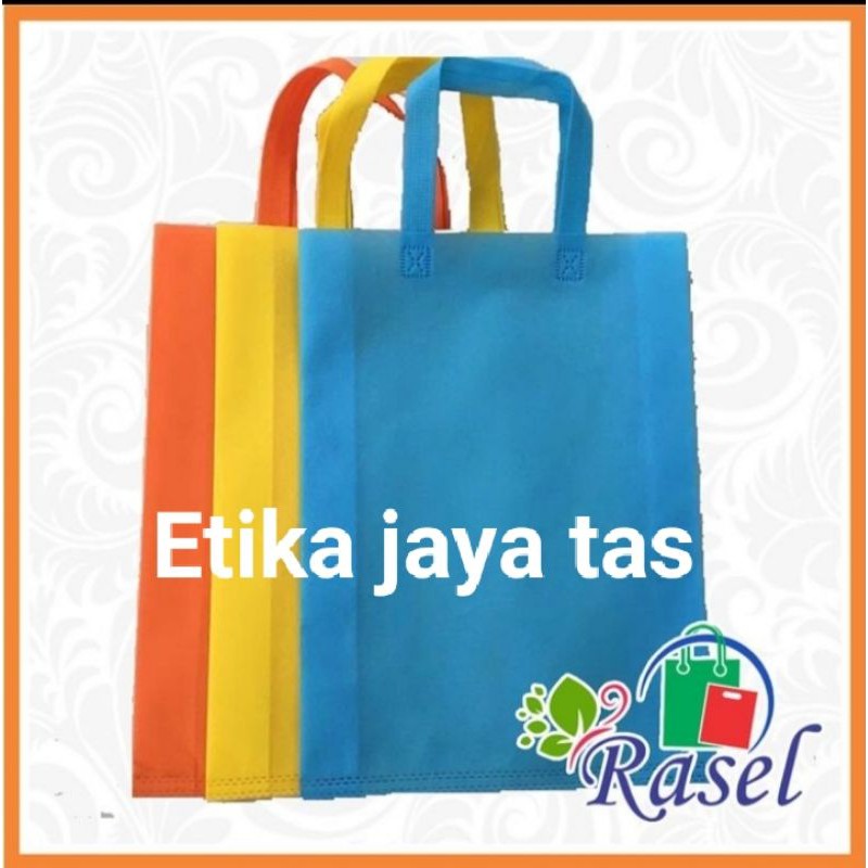 tas press/tas spunbond goodie bag tali uk jumbo/besar/kecil(20x25 , 25x35 , 30x40 , 38x45 ) untuk kantong belanja lipat