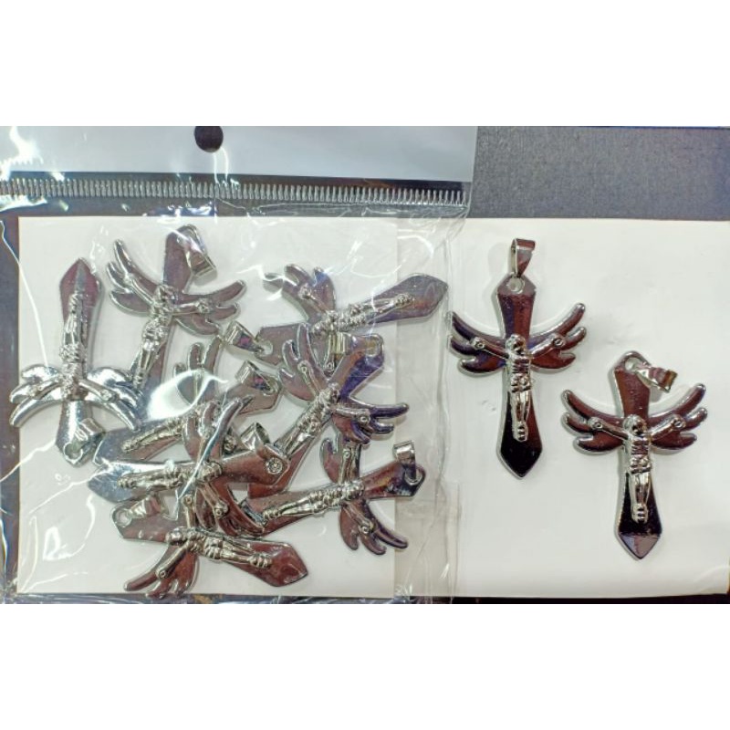 Liontin salib harga/pack isi 10pcs 1motif