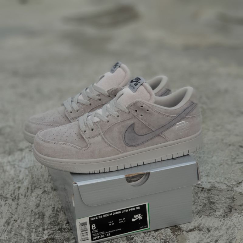nike sb dunk low pro qs reigning champion grey