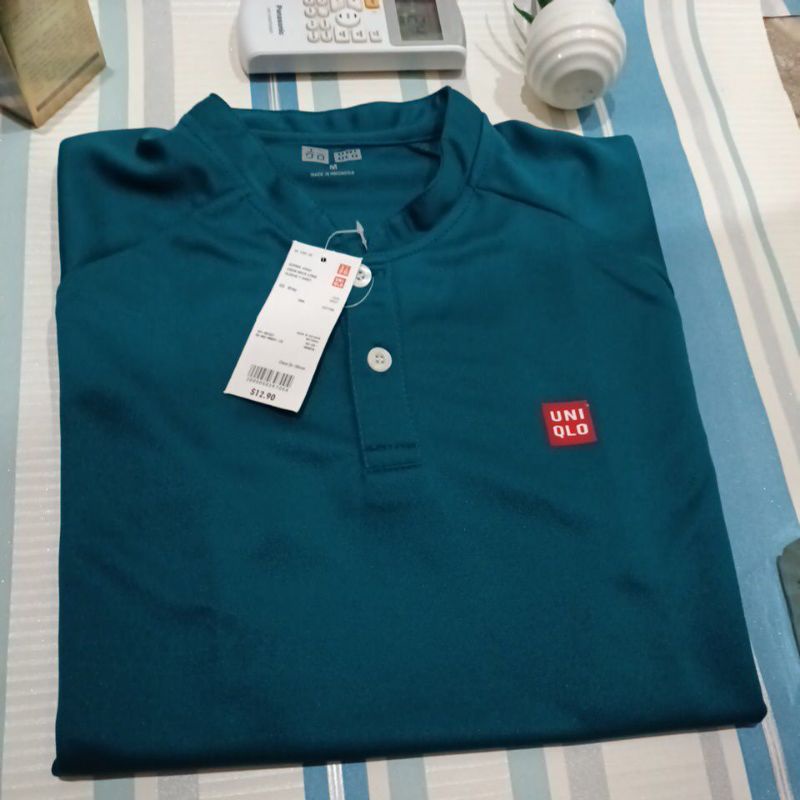 Kaos polo shirt pria UNIQLO shanghai  branded qualitas eksport