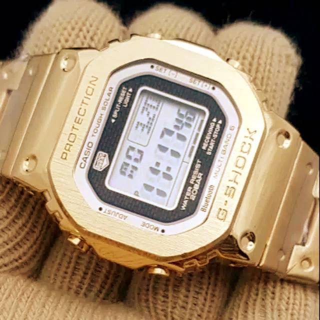 g shock dw 5600 gold