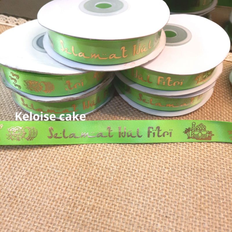 

PITA SATIN IDUL FITRI WARNA HIJAU KETUPAT UKR 1.5 CM (SABLON TIMBUL)