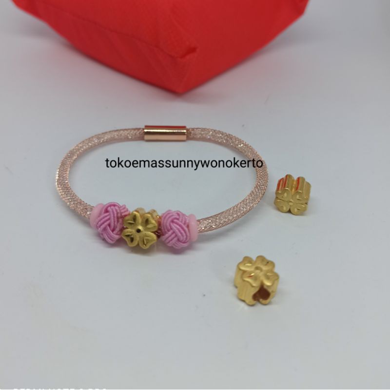 Charm emas asli kadar 375%