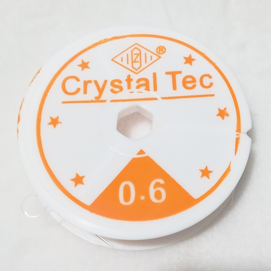 SENAR ELASTIS CRYSTAL TEC Diameter 0.6 mm 10m  Korea Warna Bening Transparan Senar Karet Aksesoris Bahan Kuat Elastis Cocok Accessories Kalung Gelang Kerajinan Tangan Prakarya Tali Karet Kenur Elastik Crystal Korea Putih Grosir Prakarya Malang