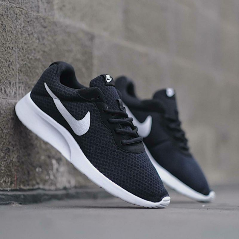 nike tanjun size 14