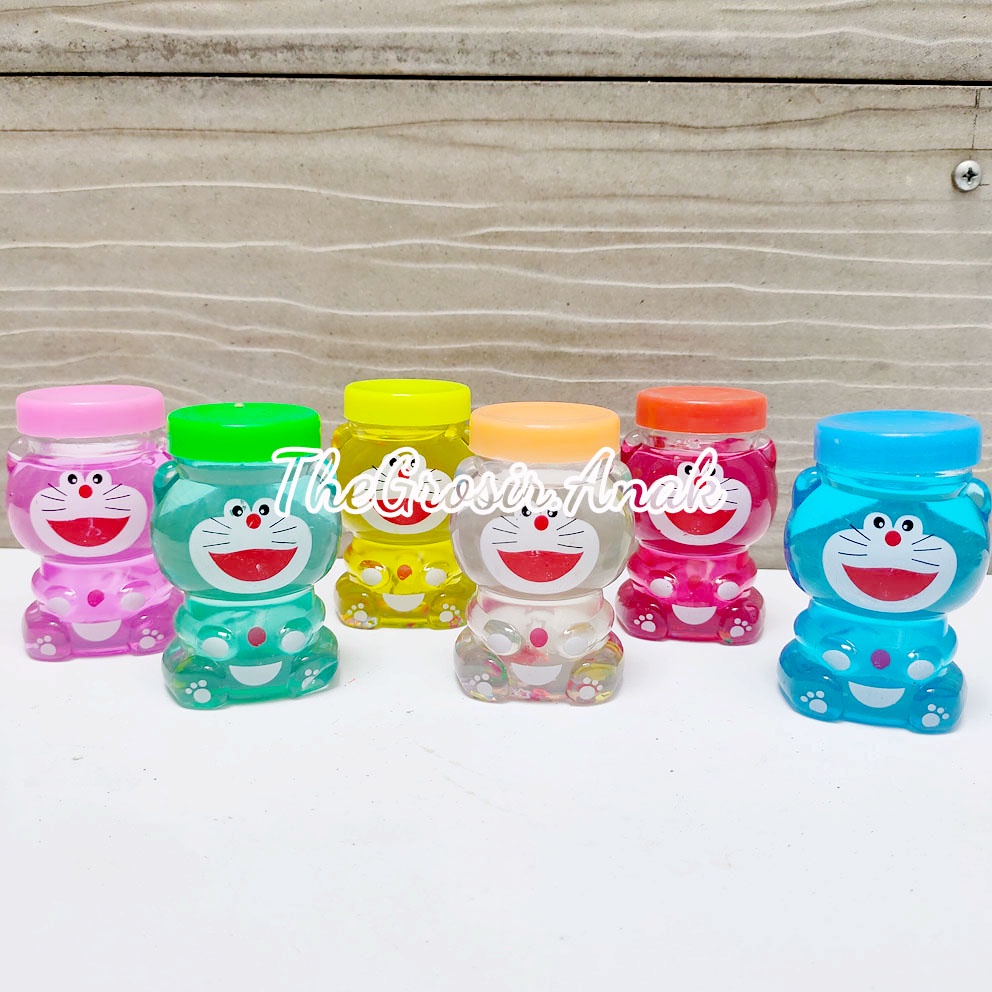 SLIME CLEAR JELLY DORAEMON BEAR BERUANG WANGI BOTOL BOLA GABUS