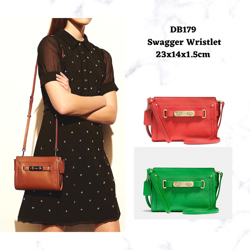 Dompet C*ach Swagger Wristlet