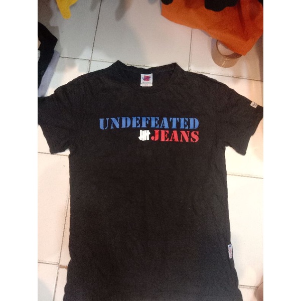 Baju Undefeated Jeans second