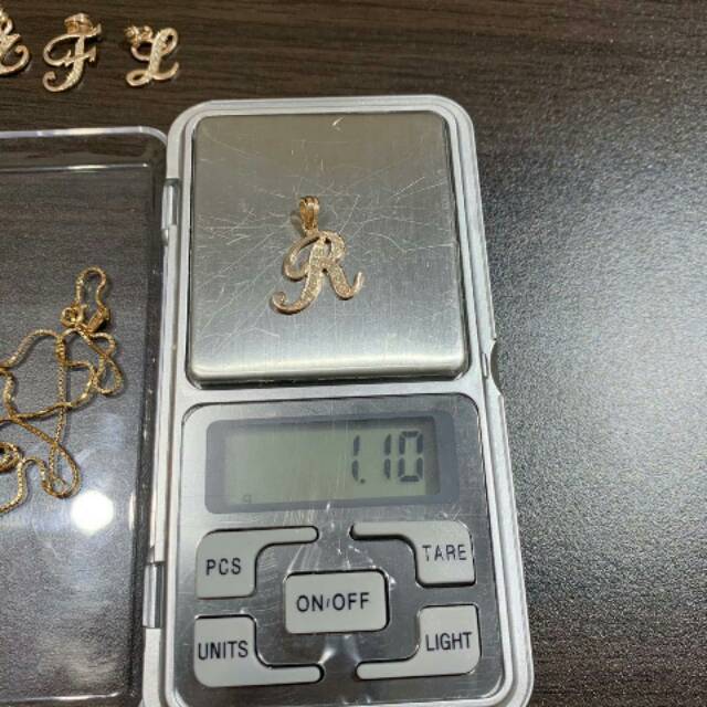 Liontin huruf Berlian Asli medan